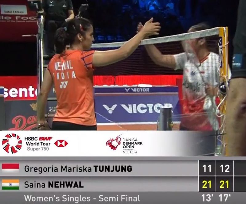 Nehwal shakes hands with Tunjung after her victory