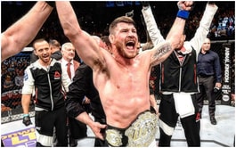 UFC broadcast team startle Michael Bisping with The Ellen Show-style prank in Halloween throwback