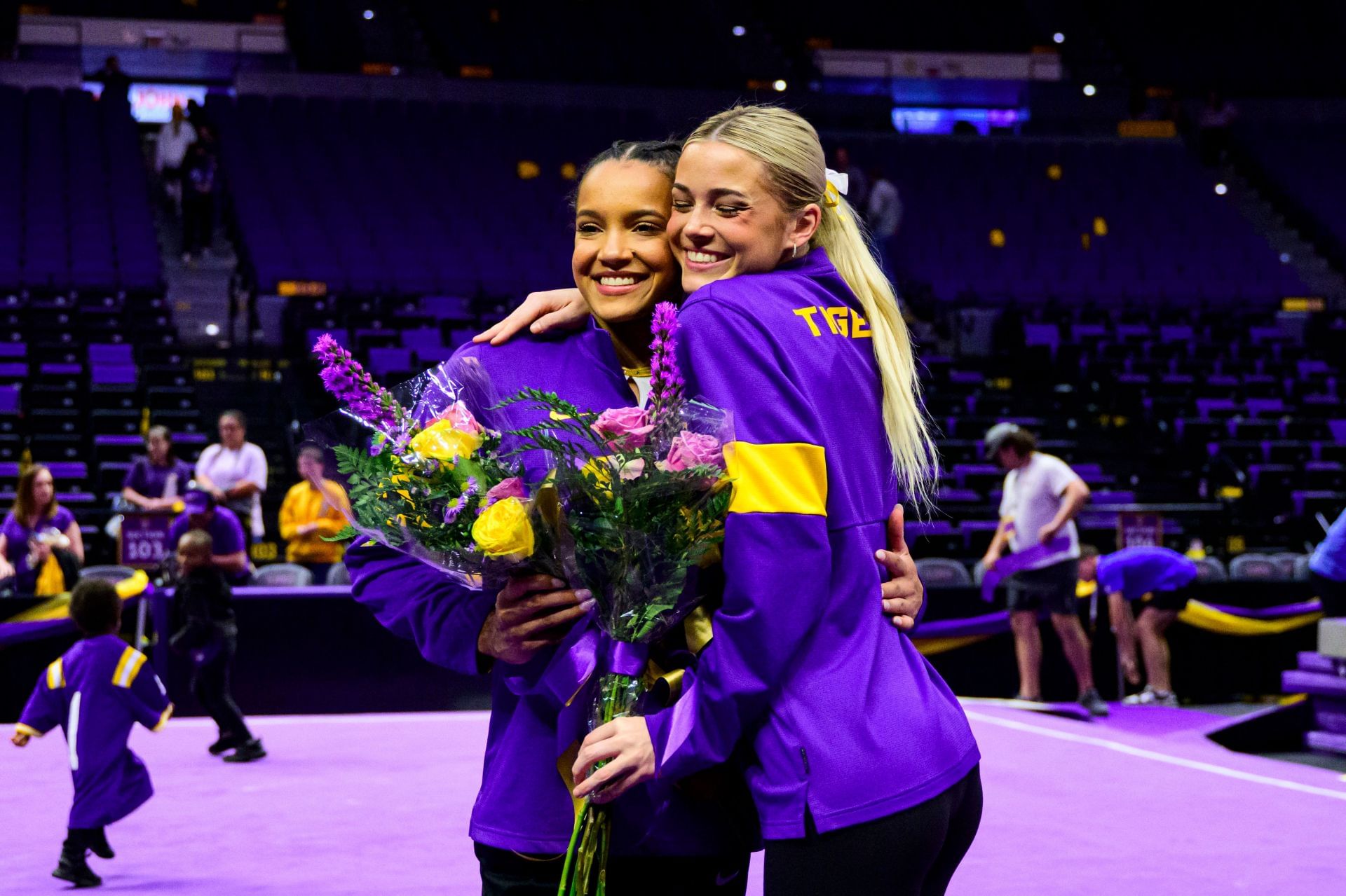 Bryant and Dunne at an LSU meet (Image Source: Getty)